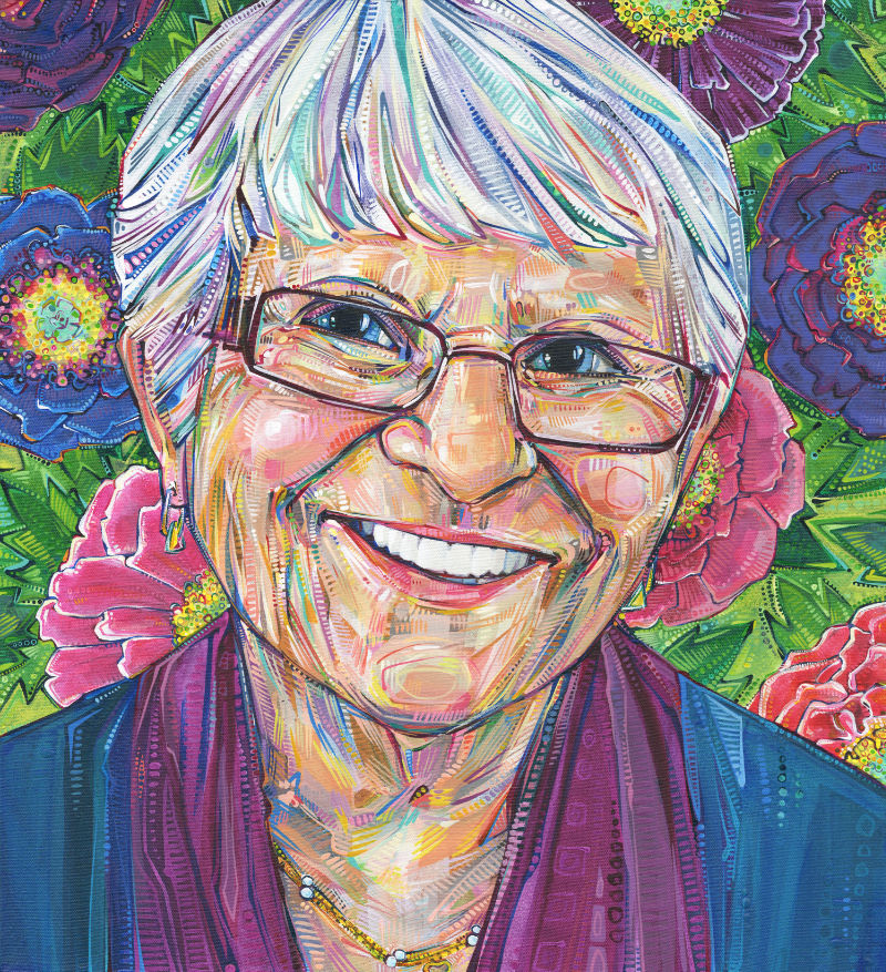 bust style portrait of a 90 year old white woman smiling and wearing glasses with peony flowers in the background