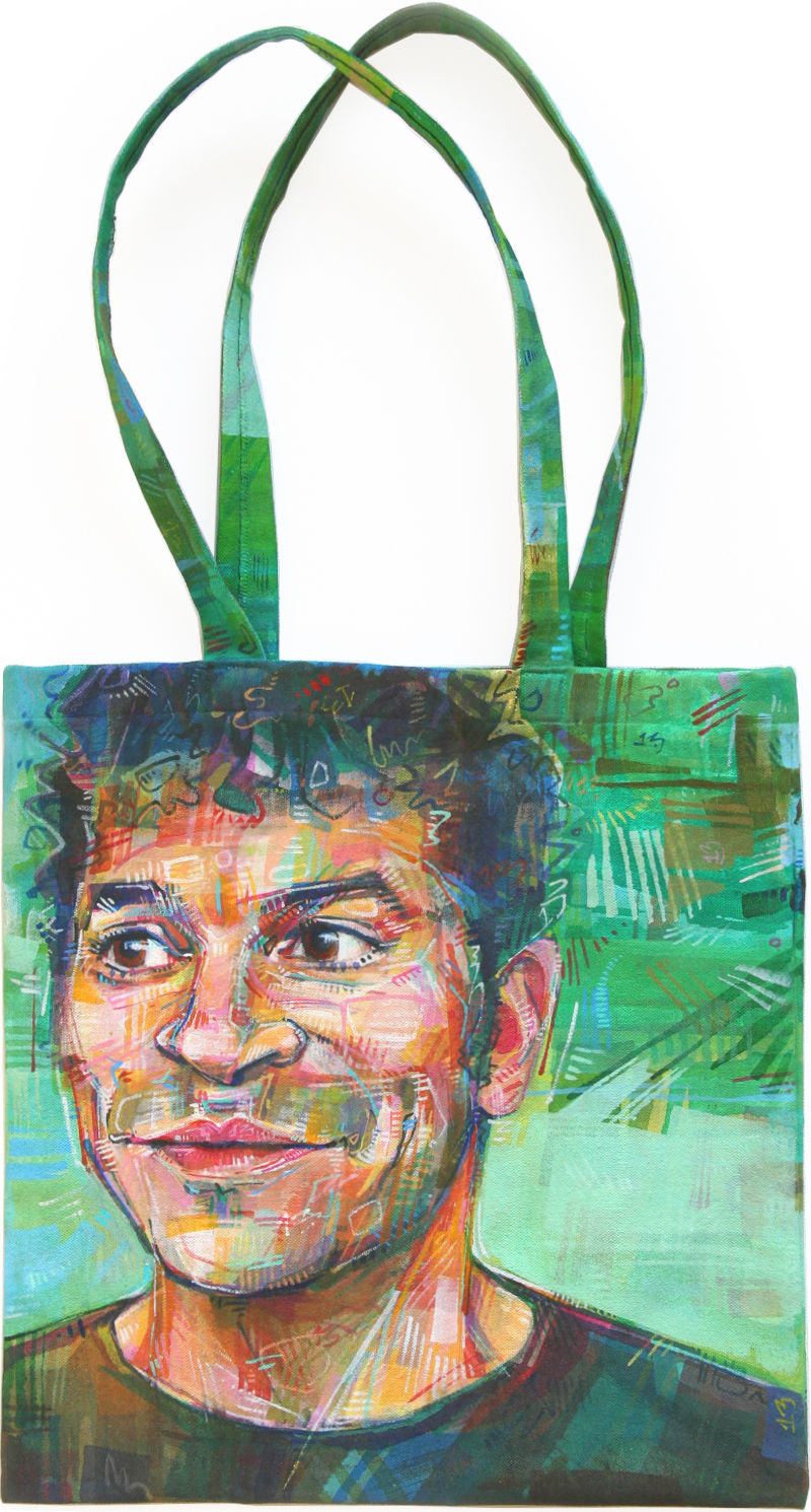 painted portrait of man on a canvas bag