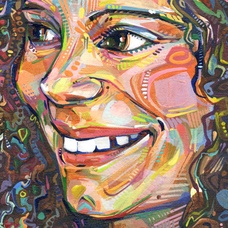 portrait of a smiling girl with curly hair