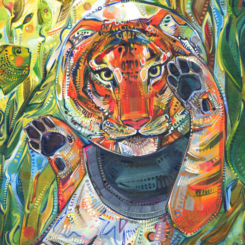 tiger wearing a glass globe helmet