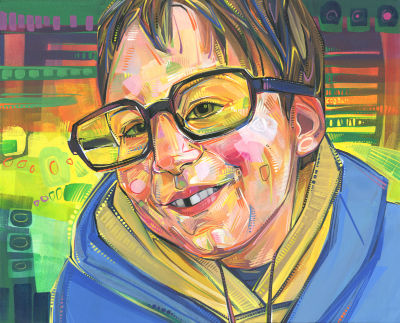 rainbow magic portrait of a little boy wearing oversized tinted glasses